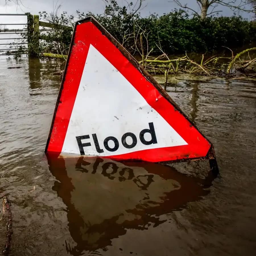 Flood sign in flood water